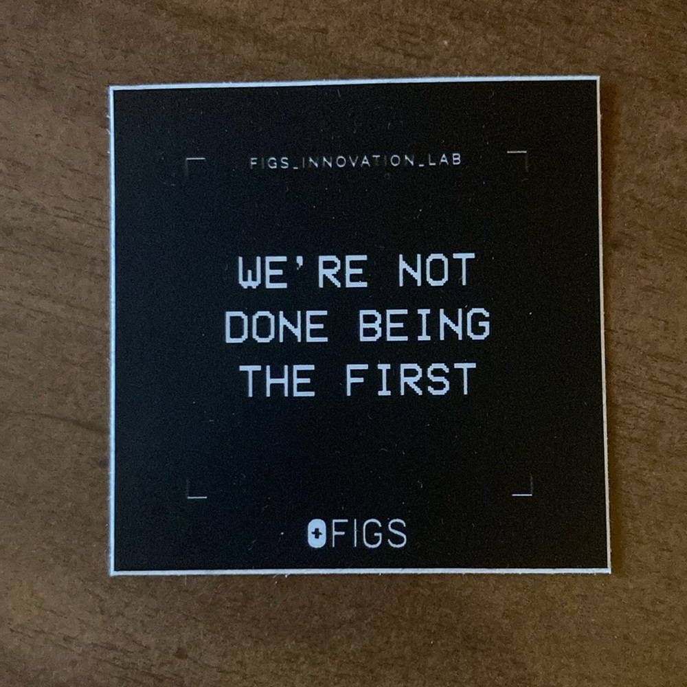 “We’re not done being first” Figs sticker